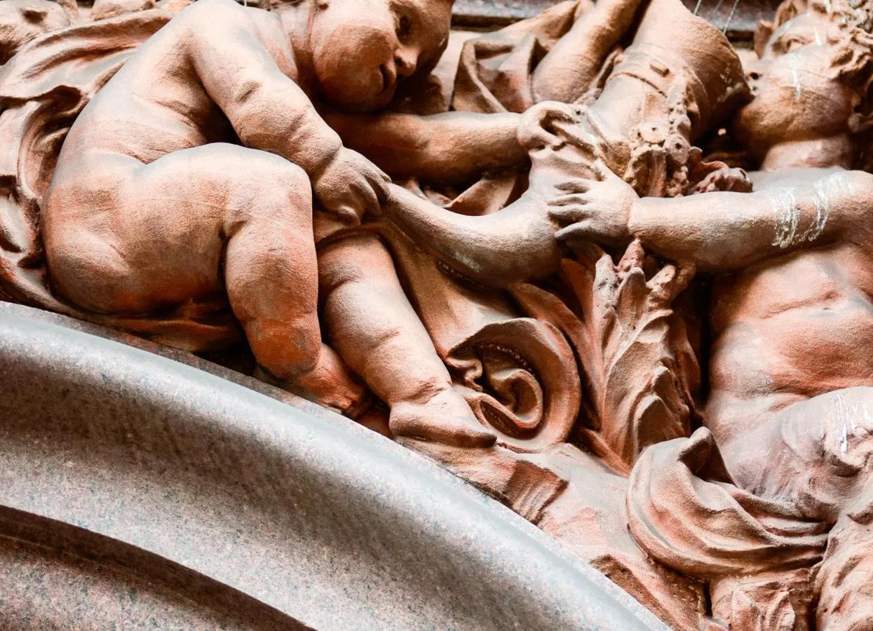 a sculpture of a man and a woman on a statue at Grey Street Hotel in Newcastle upon Tyne